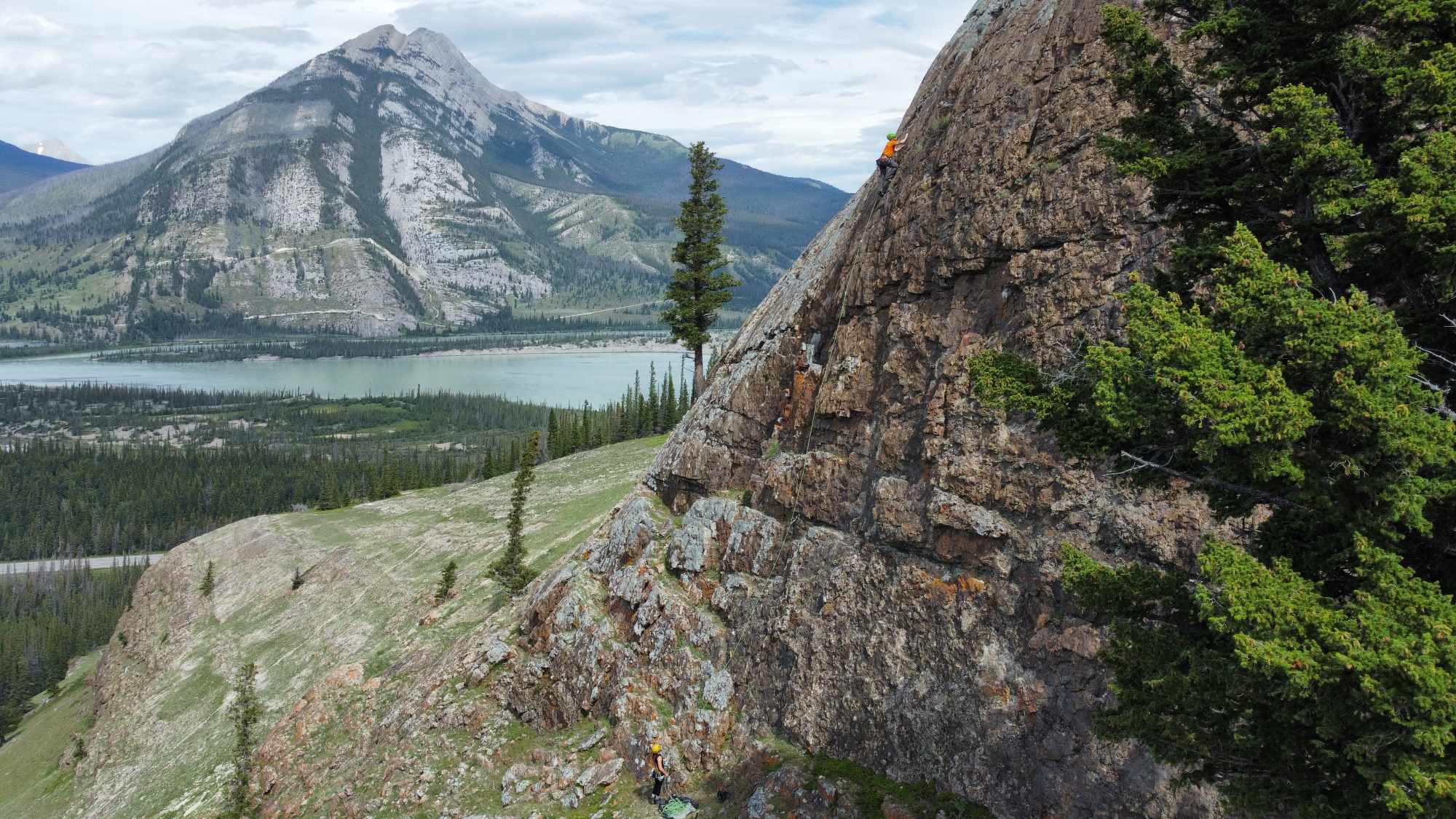 A picture of a cliff with the names of rock climbing routes. Left hand side of the crag.